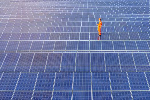 Engineers are checking the solar panel for maintenance. And clean the solar panel is always available.