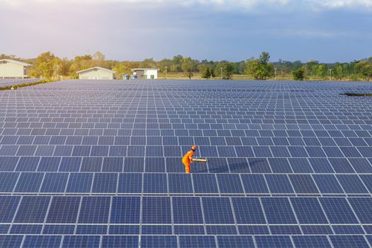 Engineers are checking the solar panel for maintenance. And clean the solar panel is always available.