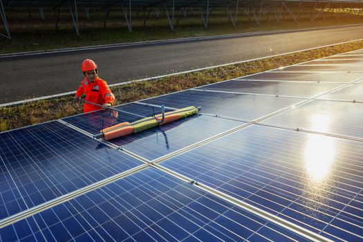 Engineers are checking the solar panel for maintenance. And clean the solar panel is always available.