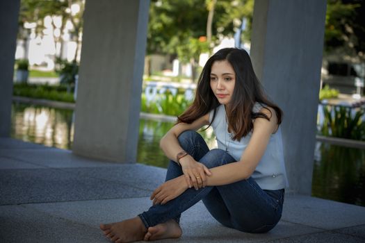 Sad young woman desperately  looking at the clock , waiting  boyfriend or lover