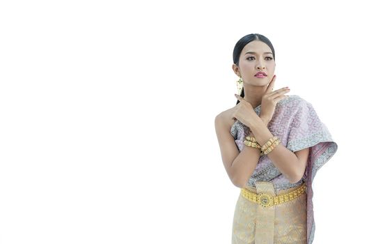 Beautiful Thai women wearing traditional Thai clothes that have a unique Thai culture. Happy asian woman with blank copyspace, isolated on white background