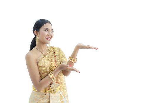 Beautiful Thai women wearing traditional Thai clothes that have a unique Thai culture. Happy asian woman with blank copyspace, isolated on white background