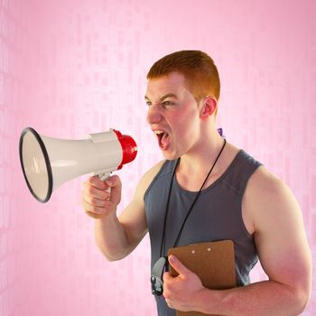 Angry personal trainer yelling through megaphone  against pink background