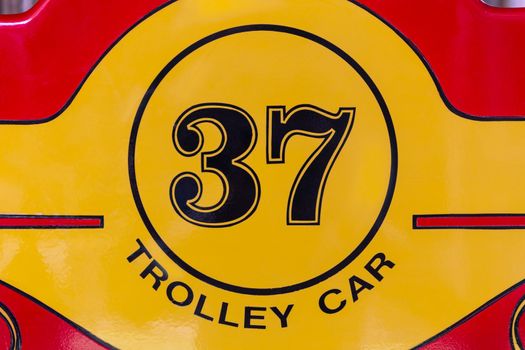 Number sign of retro and classic trolley car.
