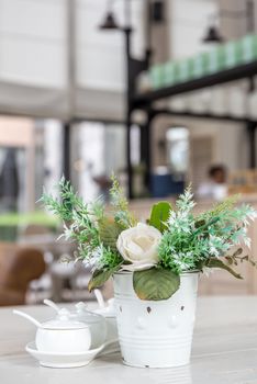 White table setting in restaurant or cafe.