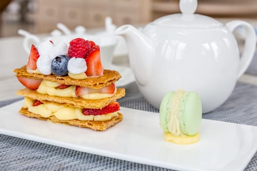 Mille Feuille, French pastry on table in cafe.