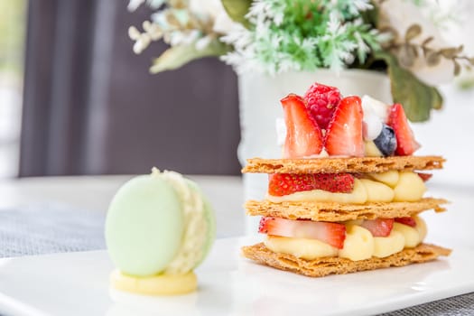 Mille Feuille, French dessert on table in cafe.