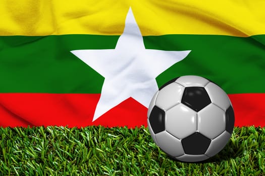 3D rendered soccer ball in grass field with Myanmar flag as Background