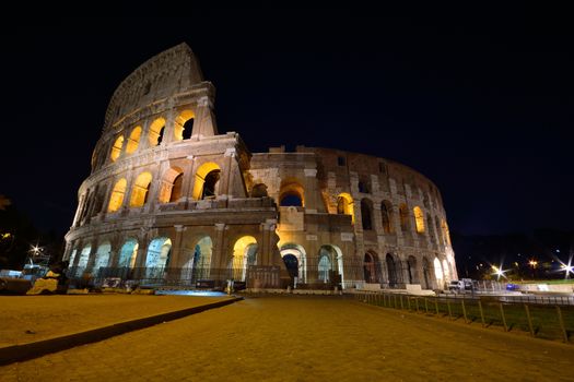 Night view of the Colosseum illuminated in Rome.