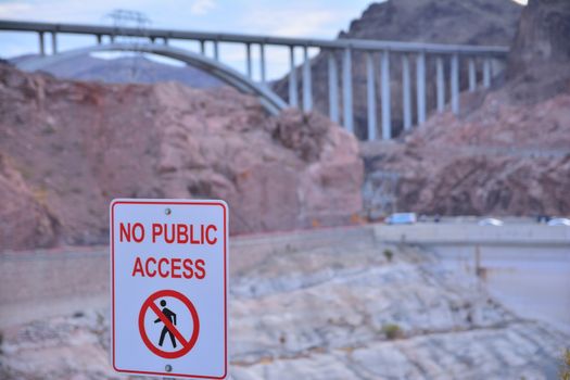 No public access sign in capitalized letters in a red font on a white background.