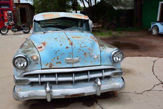 Seligman, Arizona, Usa Ð July 24, 2017: Rusty abandoned Chevrolet car in Seligman, Arizona.