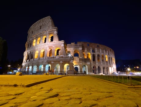 Night view of the Colosseum illuminated in Rome.