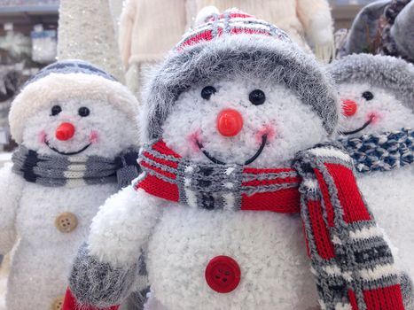 Funny three snowmen in the winter scenery. Christmas decoration