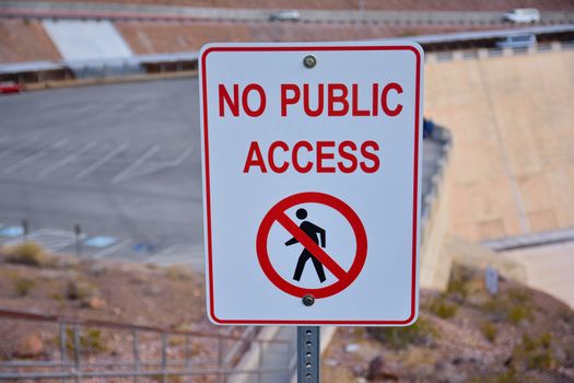 No public access sign in capitalized letters in a red font on a white background.