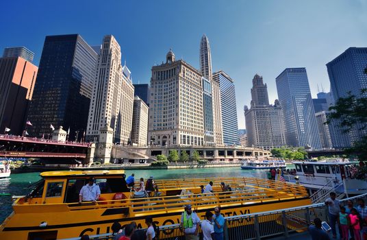 Chicago, Usa - July 15, 2017: Chicago Water Taxi on the Chicago River in downtown Chicago on July 15, 2017. The Chicago River serves as the main link between the Great Lakes and the Mississippi Valley waterways.