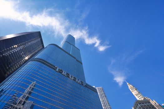 Chicago, USA - July 15, 2017: Trump Tower skyscraper building on Chicago River. Trump International Hotel and Tower, also known as Trump Tower Chicago and Trump Tower, is a skyscraper hotel in downtown Chicago, Illinois.