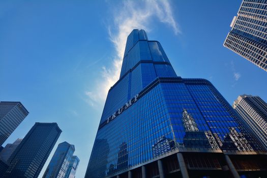 Chicago, USA - July 15, 2017: Trump Tower skyscraper building on Chicago River. Trump International Hotel and Tower, also known as Trump Tower Chicago and Trump Tower, is a skyscraper hotel in downtown Chicago, Illinois.