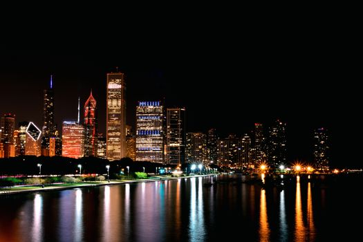 Chicago night skyline across Lake Michigan.