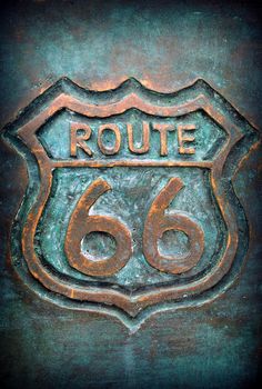 Old route 66 sign in bronze with color.