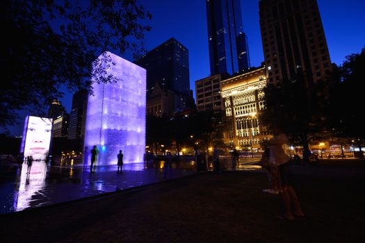 CHICAGO, USA - JULY 15 : View of the Crown Fountain in Millennium Park in Chicago on July 15, 2017. The fountain is interactive work of public art and video sculpture designed by Jaume Plensa