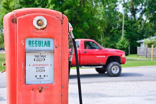 Cuba, Missouri, Usa Ð July 18, 2017: Old rusty american gas pump in Cuba, Missouri. Displaying the price in dollars and filling amount in gallons.