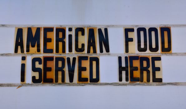 Retro american food sign on route 66 diner.