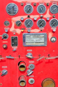 Close-up fire truck equipment detail. Fire control panel, dials and dashboard.
