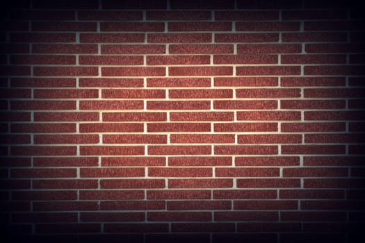 Red brick wall texture background with vignetting corners