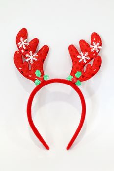 Headband Christmas, Reindeer antlers Red doll headband-hairbrush hat for festival of Christmas and new year isolated on a white background