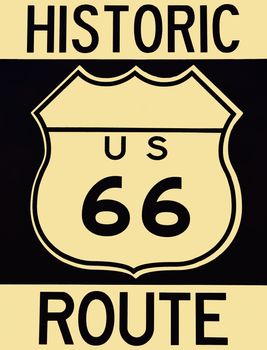 Old historic Route 66 sign with the legend US 66.