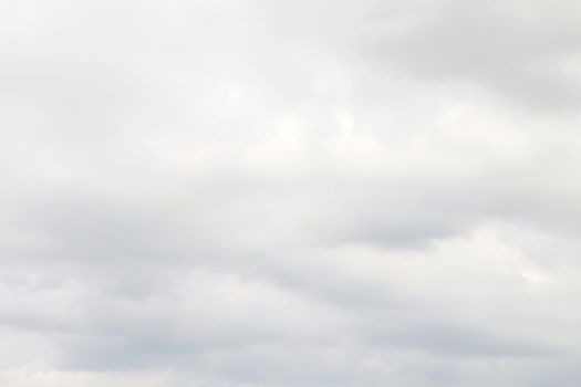 Sky white rain storm background, puffy gray white clouds soft background