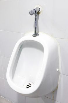 urinals white, close up white urinals in men's bathroom, white ceramic urinals for men in toilet room