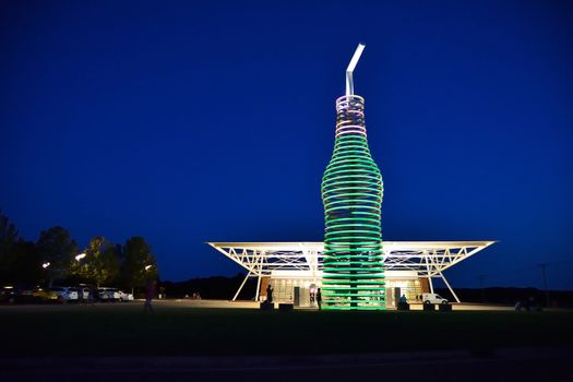 Arcadia, Oklahoma - July 19, 2017: Drive down historic route 66 through Arcadia, Oklahoma, and you canÕt miss the neon, 66-foot-tall soda bottle in front of POPS. The biggest bottle of soda in the world