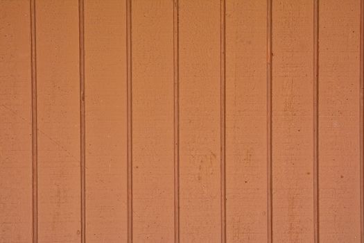 Close-up of vertical wooden planks of brown color
