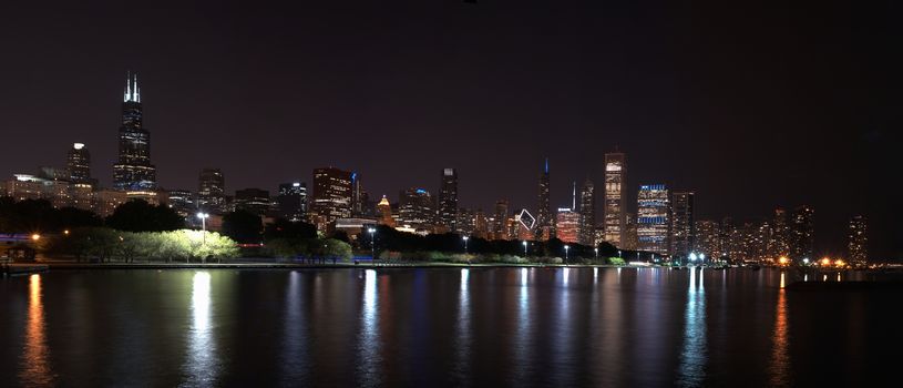 Chicago night skyline across Lake Michigan.