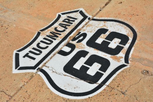 Route 66 sign painted on the road in Tucumcari