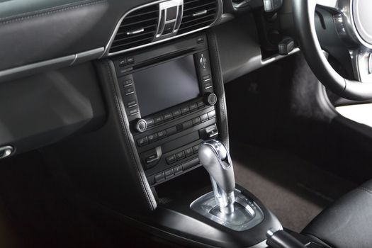 Luxury car interior with tech and media features