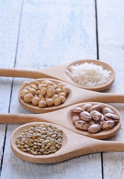 Close-up of different cereals arranged in spoons