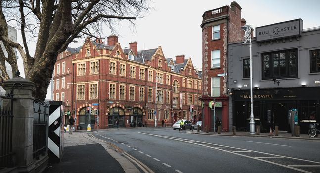 Dublin, Ireland - February 11, 2019: Architecture detail and street atmosphere in a shopping street on a winter day