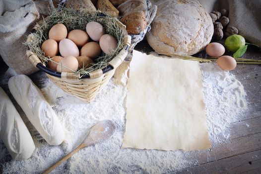 Rustic ingredients for bread on wooden table.From above