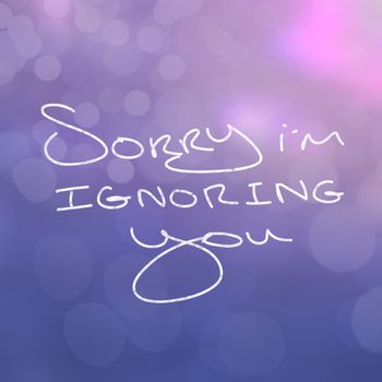 Close up of words saying sorry im ignoring you on purple background