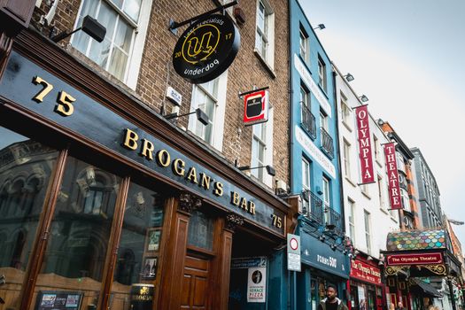 Dublin, Ireland - February 11, 2019: Architecture detail and street atmosphere in a shopping street on a winter day