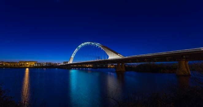 Night view of famous Lusitania Bridge in Merida, made by the famous architect, Santiago Calatrava. Extremadura. Spain.