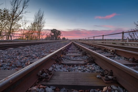 railway crossing sunset