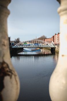 Dublin, Ireland - February 11, 2019: view of the shores of the river Liffey on a winter day, a river crossing Dublin from side to side