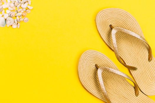 Bright flip-flops on color wooden background