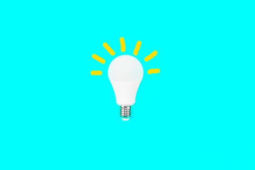 Light bulb in the blue background. Idea concept.