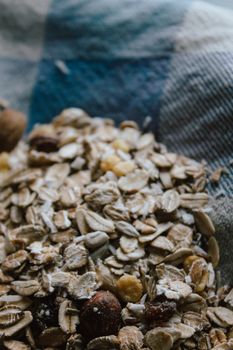 Muesli with nuts for bulk breakfast. Sustainable product in bulk on local typical recycled fabric. A breakfast rich in fiber and vitamins.