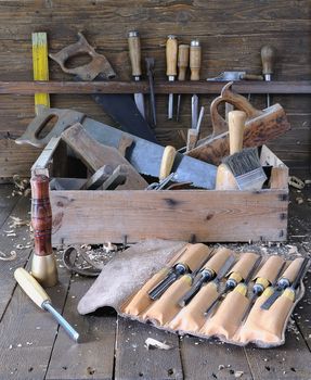 Old toolbox on the workbench in a carpentry