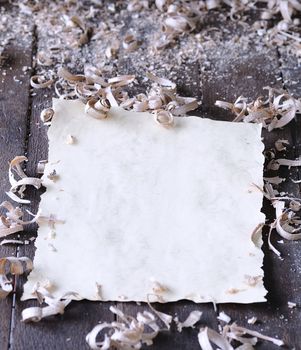 Old blank parchment on the workbench carpentry.